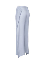 A detail shot of the ISSEY MIYAKE SHADOW STUDY PLEATS SOLID trousers.