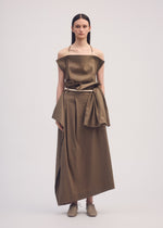 A model wears the ISSEY MIYAKE CLOTH AND CORD skirt.