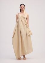 A model wears the ISSEY MIYAKE CLOTH AND CORD dress.