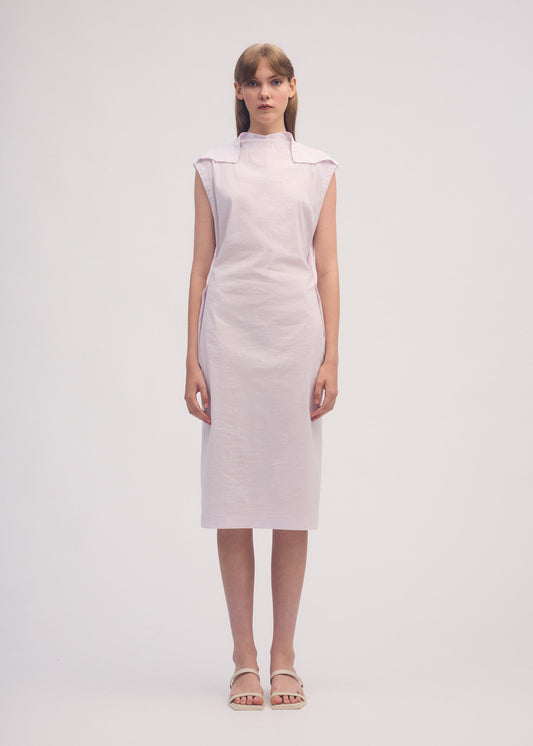 A model wears the ISSEY MIYAKE AMPLE dress.