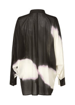 A detail shot of the ISSEY MIYAKE SHADOW STUDY shirt.