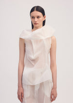 A model wears the ISSEY MIYAKE SHADE AND SHADED shirt.