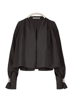 A product shot of the ISSEY MIYAKE CLOTH AND CORD cardigan in .