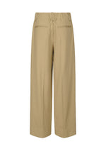 A detail shot of the ISSEY MIYAKE SIMPLE ENSEMBLE trousers.
