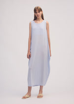 A model wears the ISSEY MIYAKE DRAPE JERSEY 56 dress.