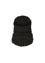 A product shot of the ISSEY MIYAKE KNIT (AS IT IS) ACC hat in black.