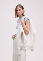 A model wears the ISSEY MIYAKE SCULPTURAL (BAG) bag.