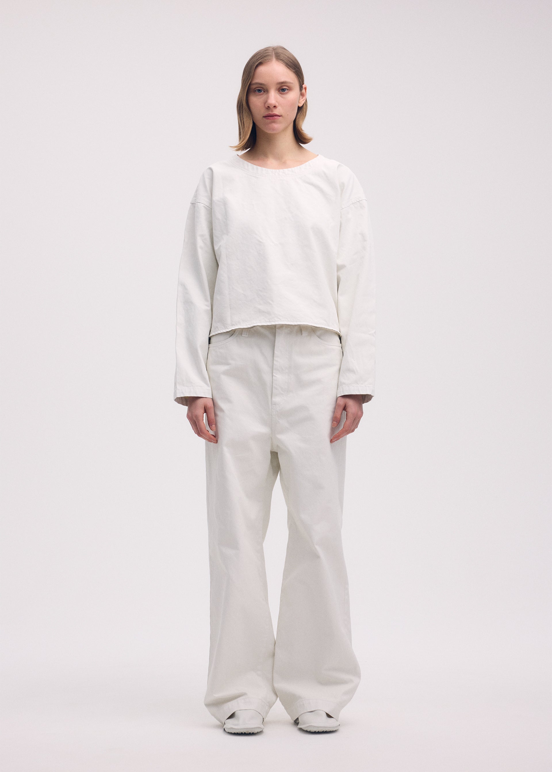 A model wears the ISSEY MIYAKE SCULPTURAL (BAG) bag.