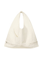 A product shot of the ISSEY MIYAKE SCULPTURAL (BAG) bag in white.