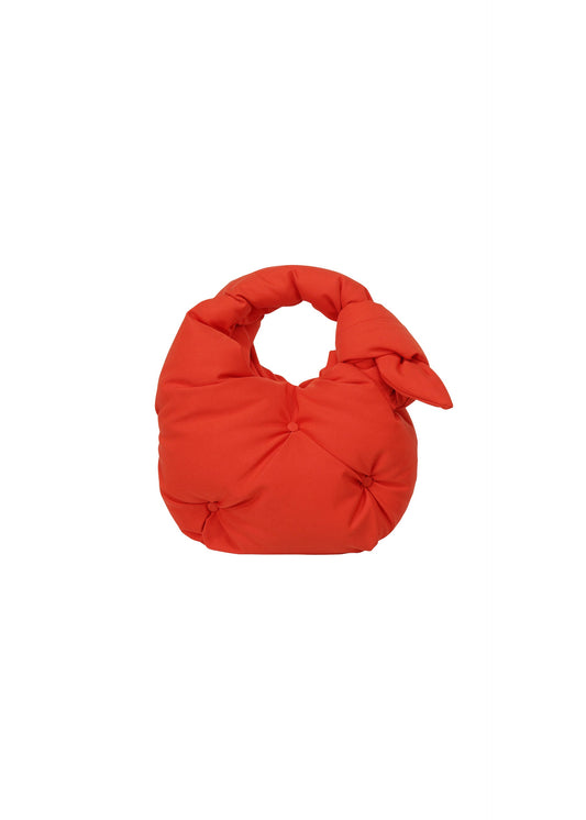 A product shot of the ISSEY MIYAKE PUMPED BAG bag in red (24).