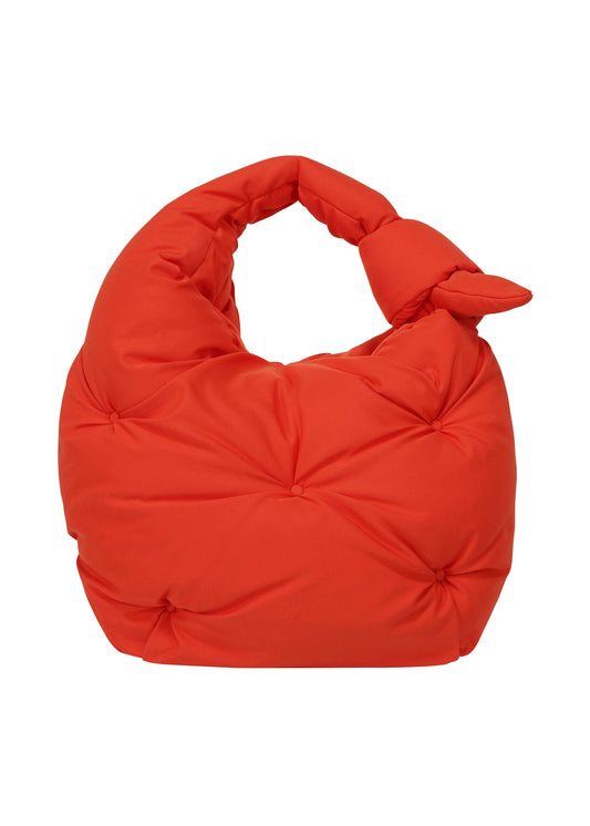 A product shot of the ISSEY MIYAKE PUMPED BAG bag in red (24).