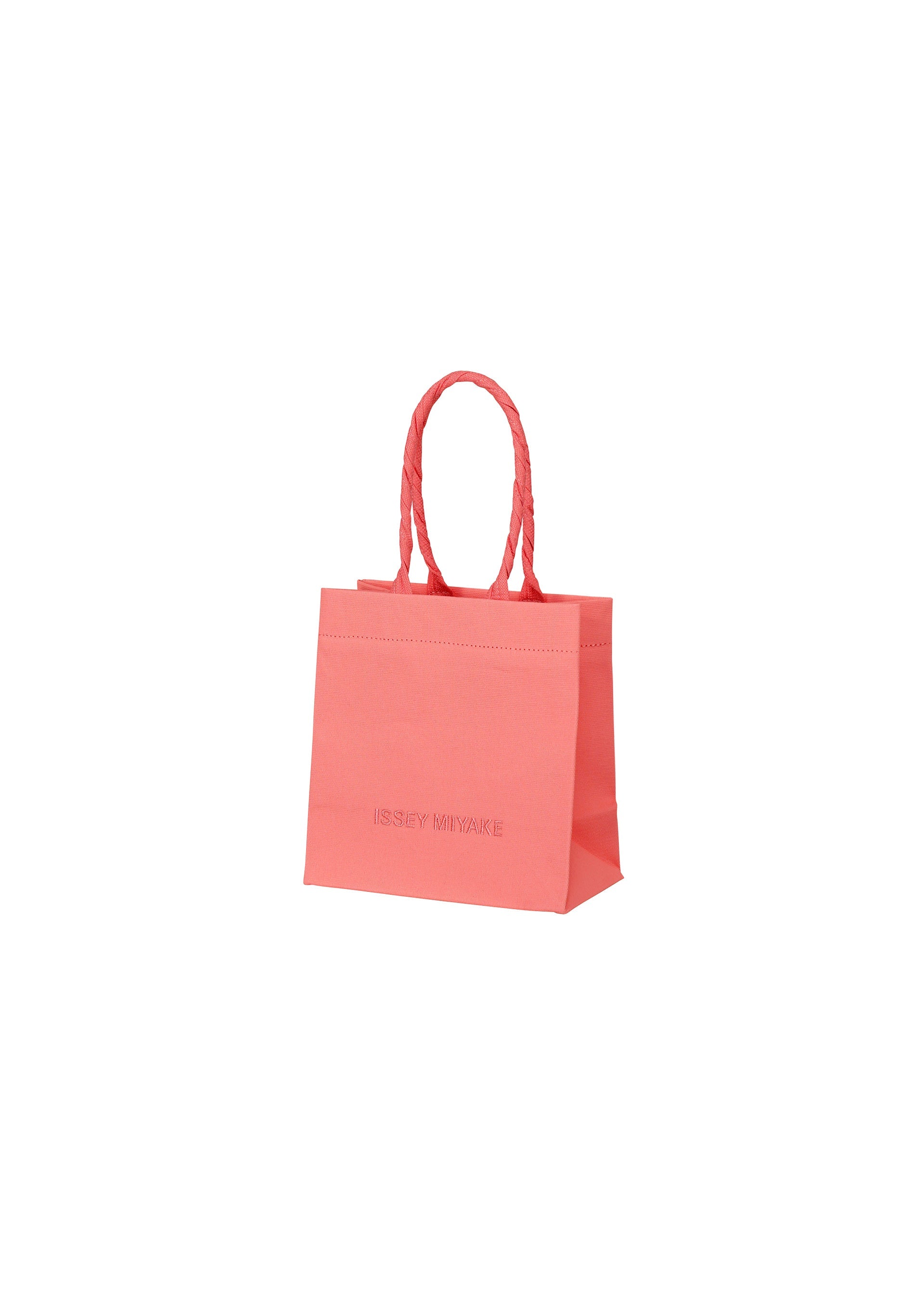A product shot of the ISSEY MIYAKE THIS IS A PAPER BAG bag in coral (23).