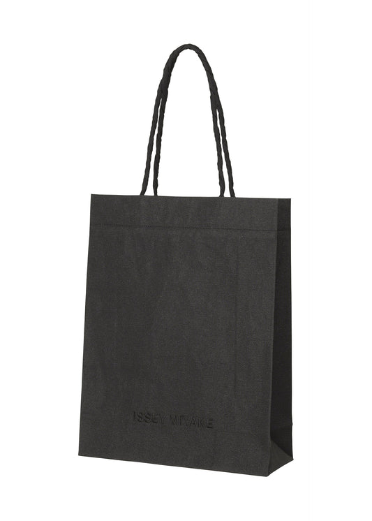 A product shot of the ISSEY MIYAKE THIS IS A PAPER BAG bag in black (15).