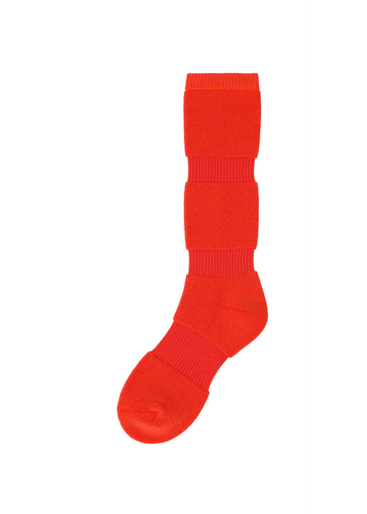 A product shot of the ISSEY MIYAKE PUMPED SOCKS socks in red (24).