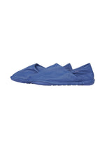 A detail shot of the ISSEY MIYAKE PEU FORM shoes.