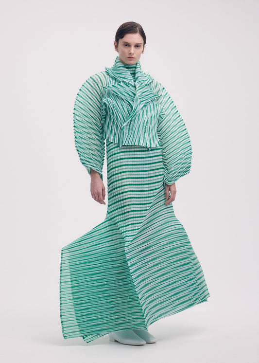 A model wears the ISSEY MIYAKE GENERIC STRIPES (HAND PLEATS) clothing.