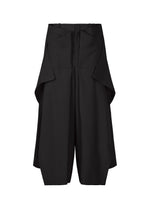 A product shot of the ISSEY MIYAKE UNI FORM (WOOL) trousers in black (15).