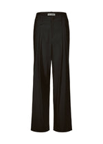 A product shot of the ISSEY MIYAKE LIKE TORSO LIKE SHIRT trousers in black.