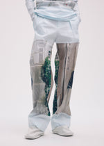 A model wears the ISSEY MIYAKE STREET VIEW trousers.