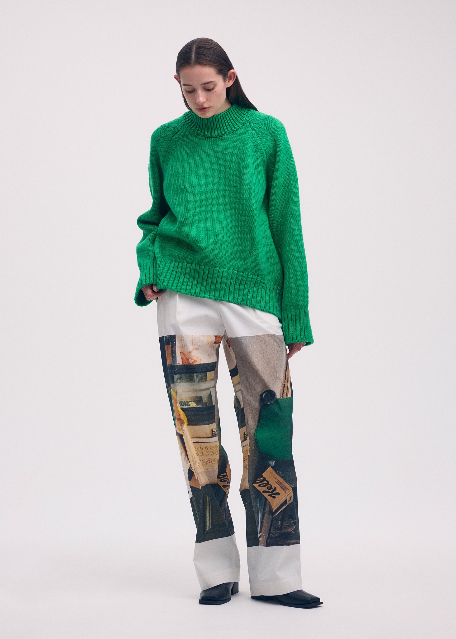 A model wears the ISSEY MIYAKE STREET VIEW trousers.