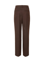 A detail shot of the ISSEY MIYAKE LIKE TORSO LIKE BLAZER trousers.