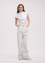 A model wears the ISSEY MIYAKE SCULPTURAL trousers.