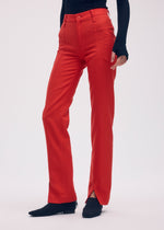A model wears the ISSEY MIYAKE DISPOCKET PANTS trousers.
