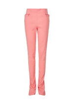 A product shot of the ISSEY MIYAKE PAPER BAG trousers in coral (23).