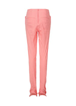 A detail shot of the ISSEY MIYAKE PAPER BAG trousers.