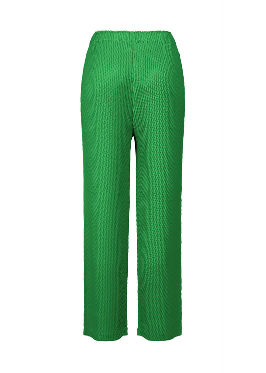 A detail shot of the ISSEY MIYAKE SLEEK PLEATS trousers.