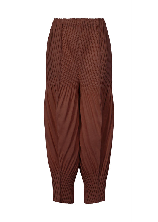 A product shot of the ISSEY MIYAKE LINEN LIKE PLEATS trousers in dark brown (45).