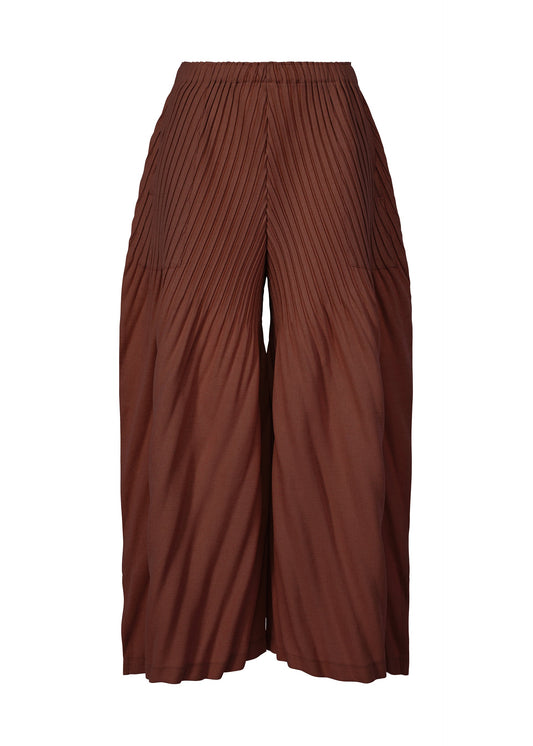 A product shot of the ISSEY MIYAKE LINEN LIKE PLEATS trousers in dark brown (45).