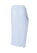 A detail shot of the ISSEY MIYAKE SOFT FOLD PLEATS skirt.