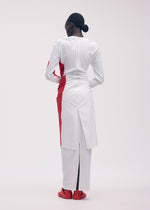 A model wears the ISSEY MIYAKE KNIT (AS REPRESENTED) dress.
