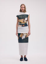 A model wears the ISSEY MIYAKE STREET VIEW dress.