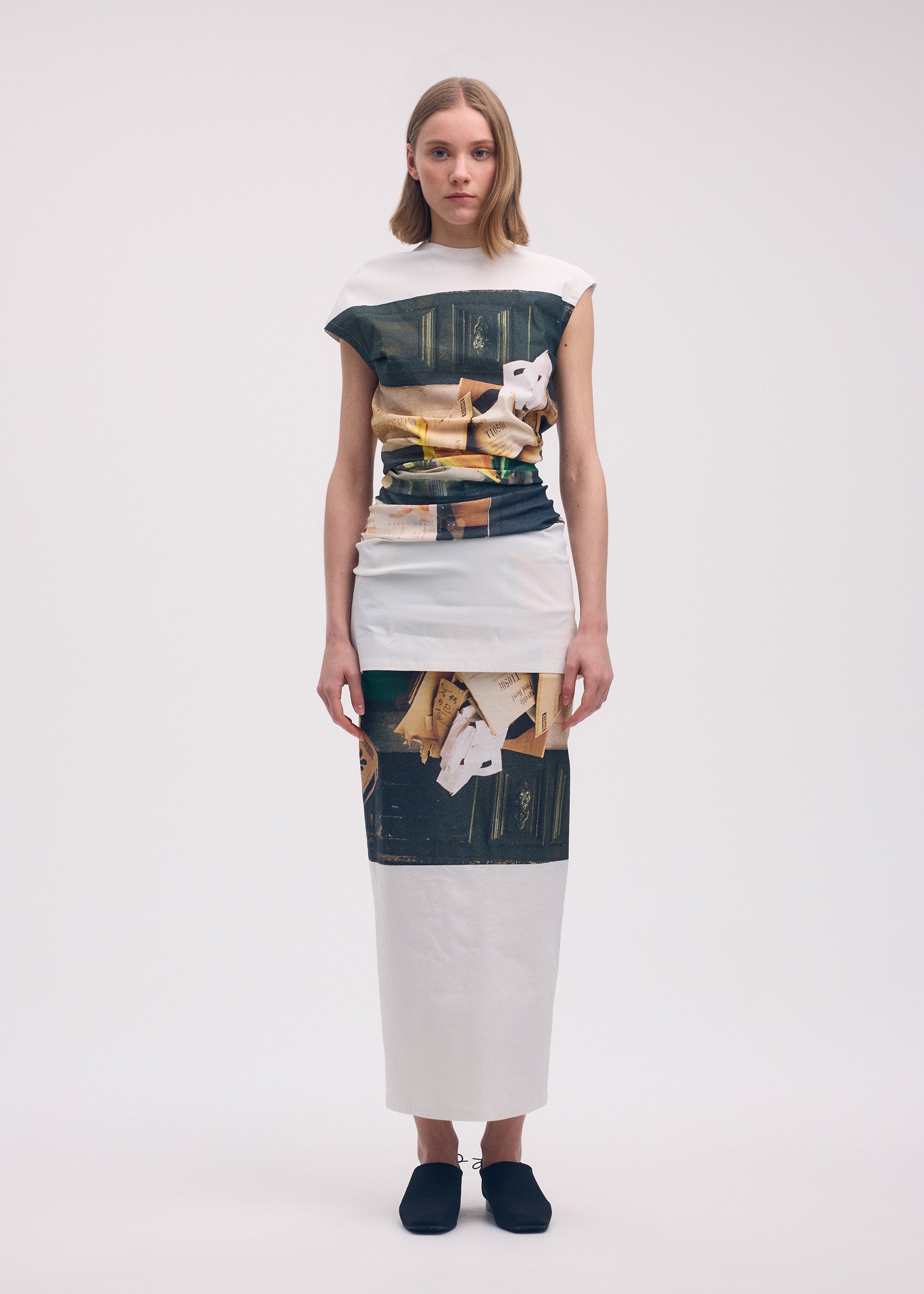 A model wears the ISSEY MIYAKE STREET VIEW dress.
