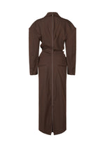 A detail shot of the ISSEY MIYAKE LIKE TORSO LIKE BLAZER dress.