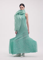 A model wears the ISSEY MIYAKE GENERIC STRIPES (MACHINE PLEATS) clothing.