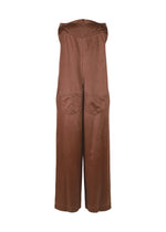 A detail shot of the ISSEY MIYAKE PSEUDO JEANS jumpsuit.