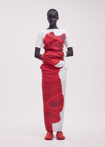 A model wears the ISSEY MIYAKE KNIT (AS REPRESENTED) shirt.