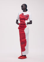 A model wears the ISSEY MIYAKE KNIT (AS REPRESENTED) shirt.