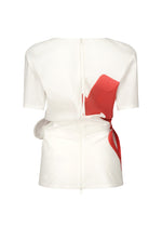 A detail shot of the ISSEY MIYAKE KNIT (AS REPRESENTED) shirt.