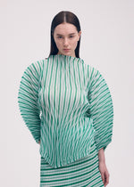 A model wears the ISSEY MIYAKE GENERIC STRIPES (HAND PLEATS) clothing.