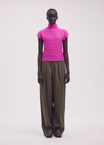 A model wears the ISSEY MIYAKE WOOLY PLEATS 58 shirt.