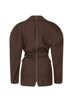 A detail shot of the ISSEY MIYAKE LIKE TORSO LIKE BLAZER tunic.