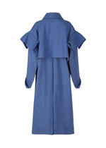 A detail shot of the ISSEY MIYAKE LEFT UNDONE coat.
