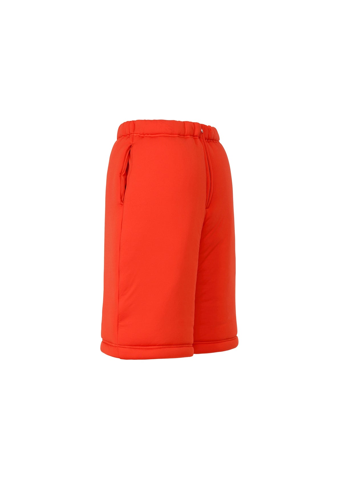 A detail shot of the ISSEY MIYAKE PUMPED T trousers.
