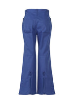A detail shot of the ISSEY MIYAKE HANG OR CARRY trousers.