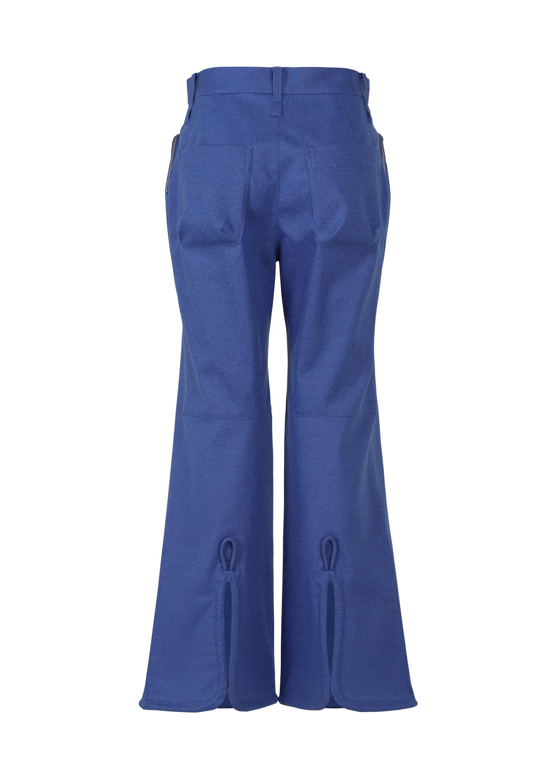 A detail shot of the ISSEY MIYAKE HANG OR CARRY trousers.