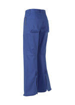 A detail shot of the ISSEY MIYAKE HANG OR CARRY trousers.